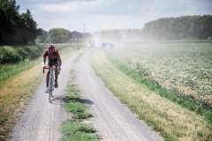 Pauwels Sauzen Vastgoedservice rider chasing the peloton. Dwars Door Het Hageland 2020One Day Race: Aarschot – Diest 180km (UCI 1.1)Bingoal Cycling Cup 2020